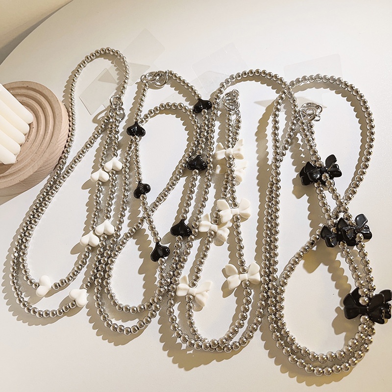 Simple Black And White Love Bow Silver Beads Diagonal Long Chain Hand Chain Universal Mobile Phone Case Mobile Phone Lanyard For Women