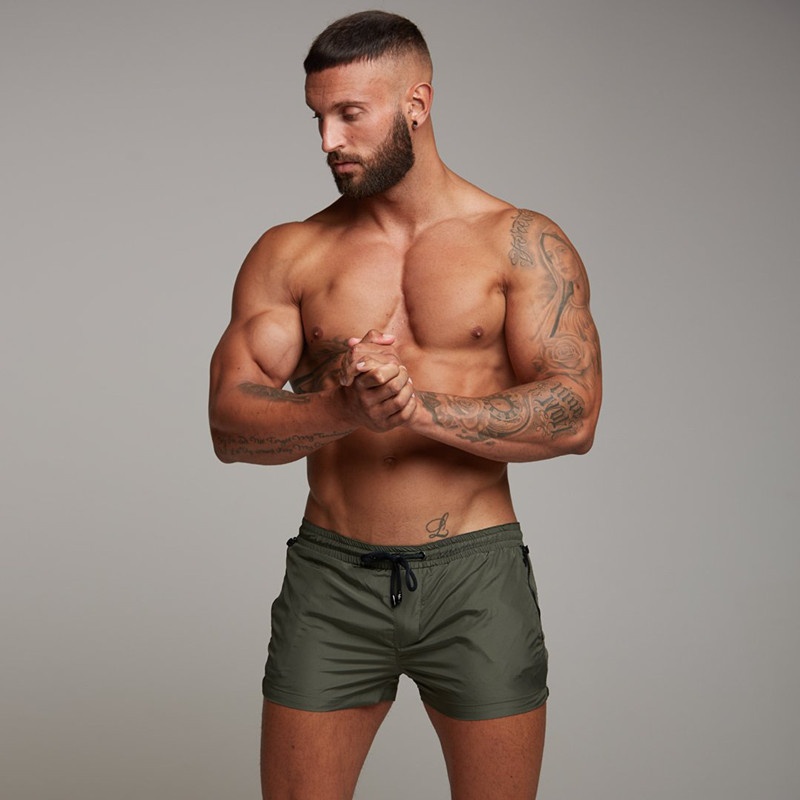 2019 Men's Casual Shorts Muscle Men Fitness Shorts Sports Running Beach Shorts