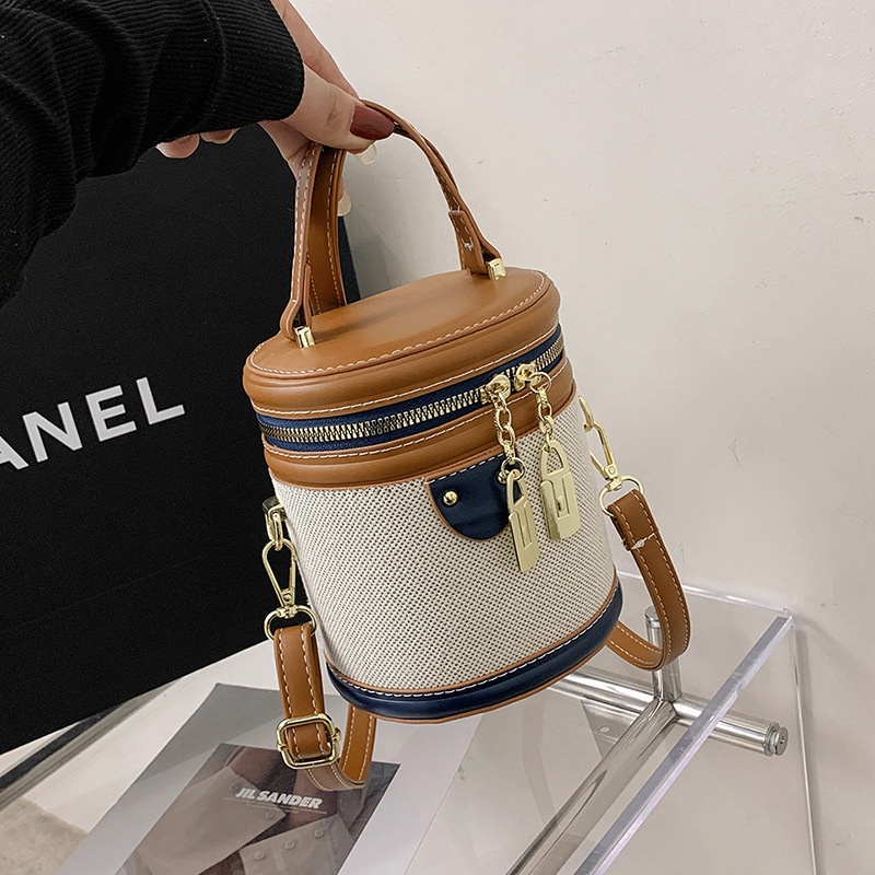 Retro Bucket Bag Women's Hand-held Fashion Cylindrical Bag Exquisite Shoulder Messenger Bag