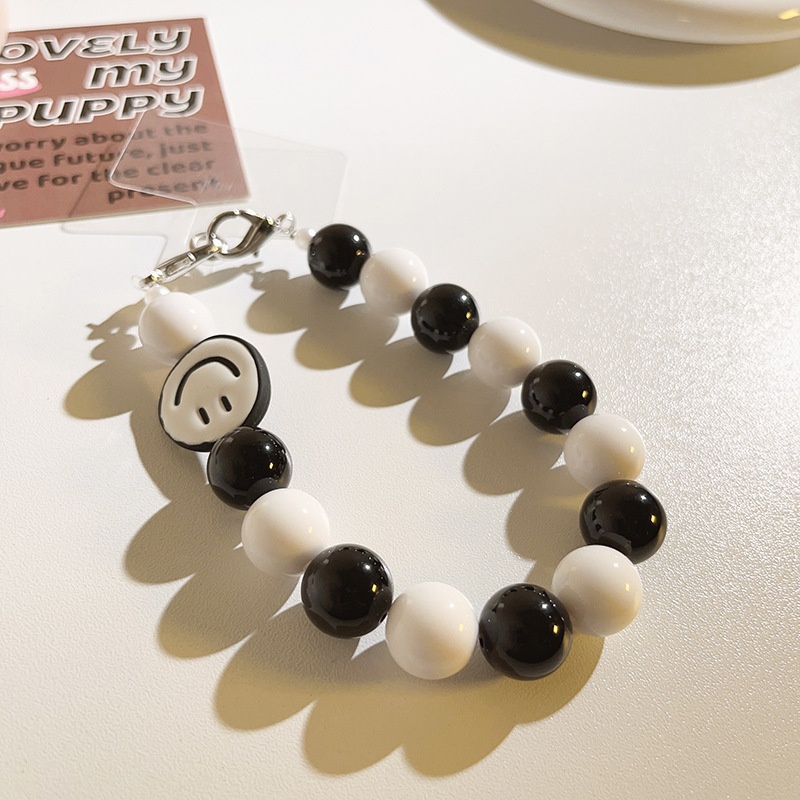 Simple Black And White Smiley Face Bead Chain Earphone Case Hanging Chain Universal Mobile Phone Case Short Hand Rope Accessories Mobile Phone Lanyard