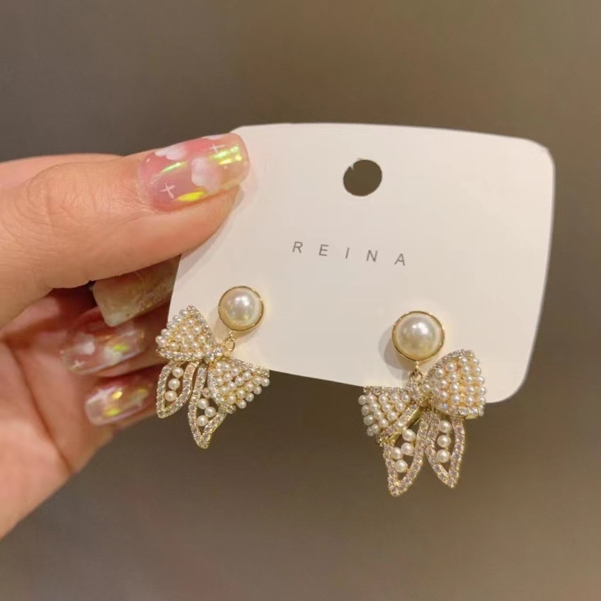 French Light Luxury High-end Pearl Bow Earrings For Women Exquisite Heavy Sweet Versatile Earrings Niche Earrings