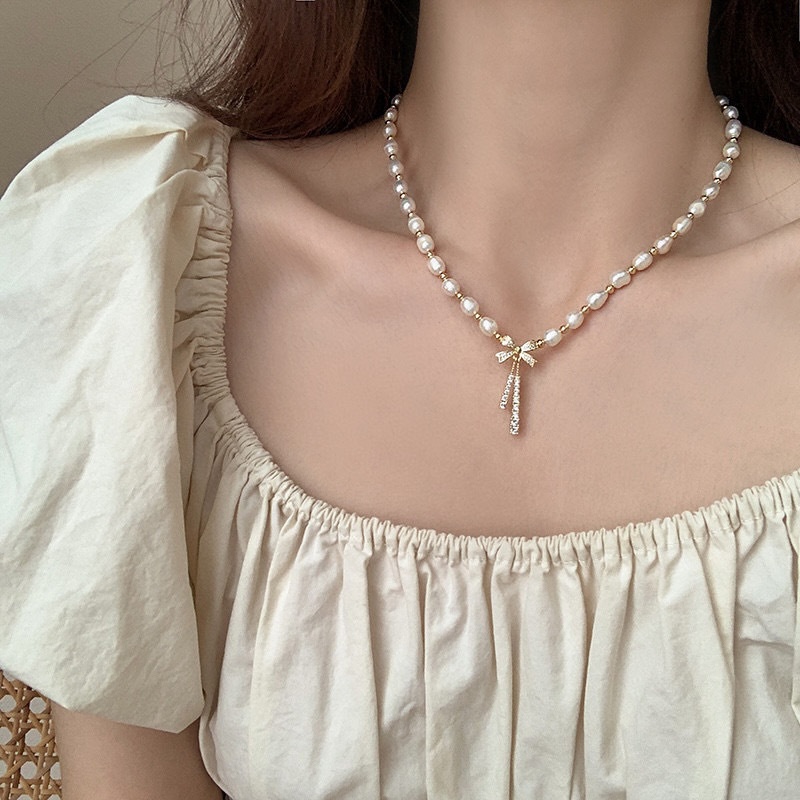 Spring And Summer French Tassel Bow Necklace Temperament High-end Natural Freshwater Pearl Clavicle Necklace Light Luxury Women