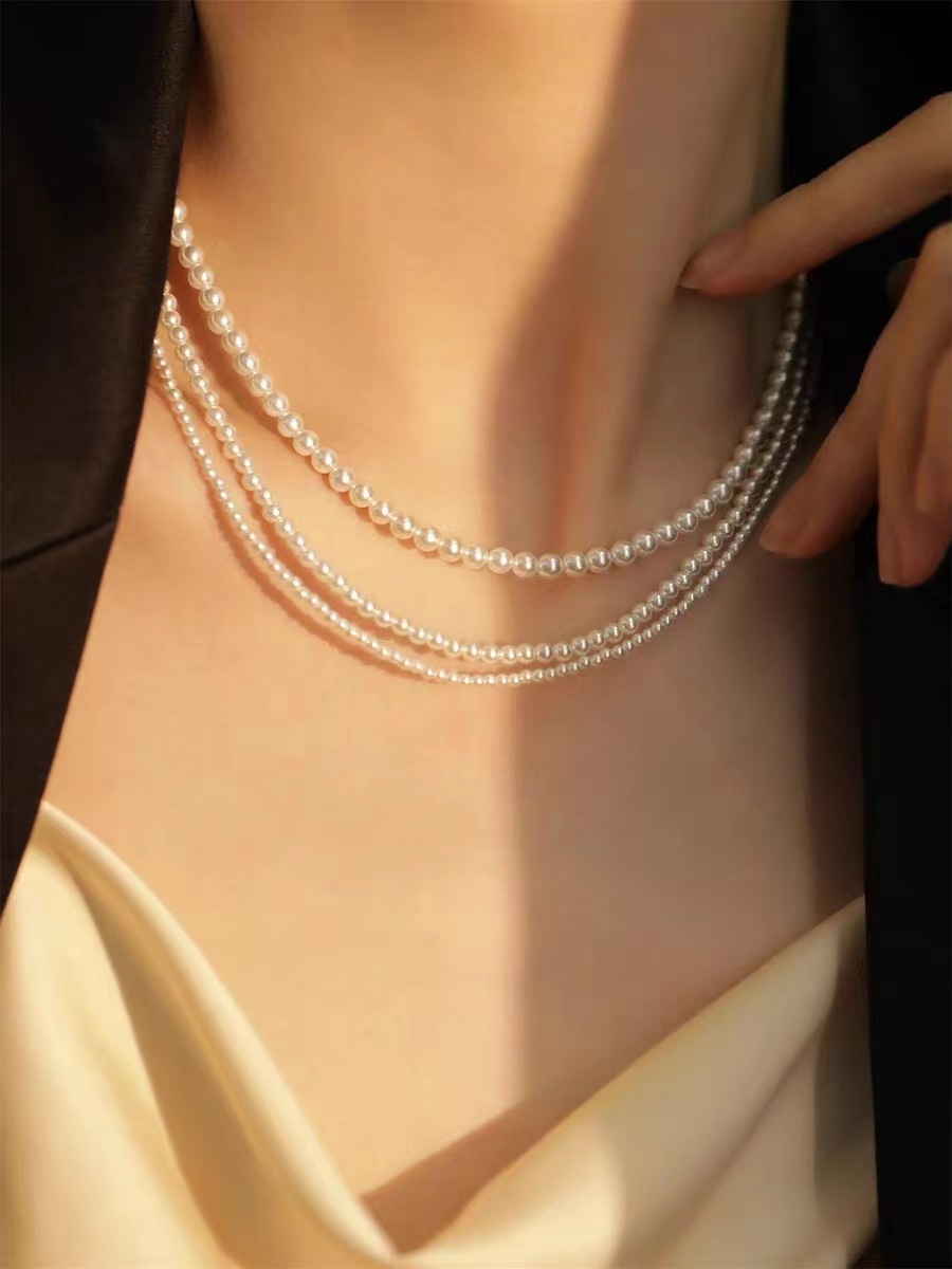 Qingdao Jushi Shijia Pearl Titanium Steel Necklace Clavicle Chain Autumn And Winter Jewelry Joker Light Luxury Women's High-end Feeling Beads